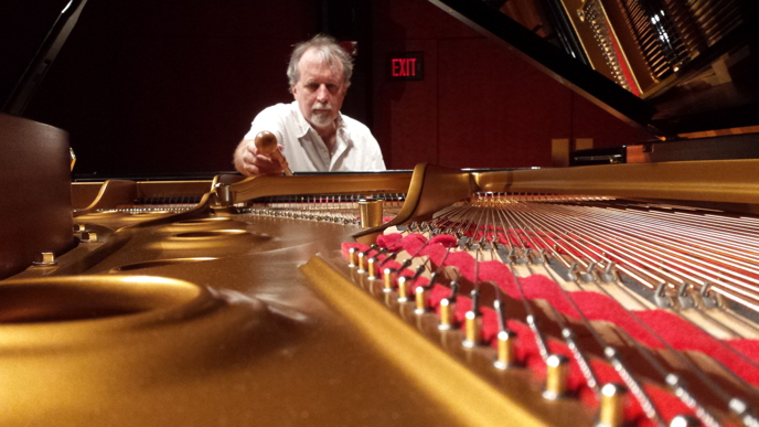 Pat tuning concert grand at CCM